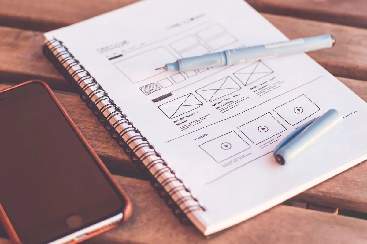 Web design workspace with laptop