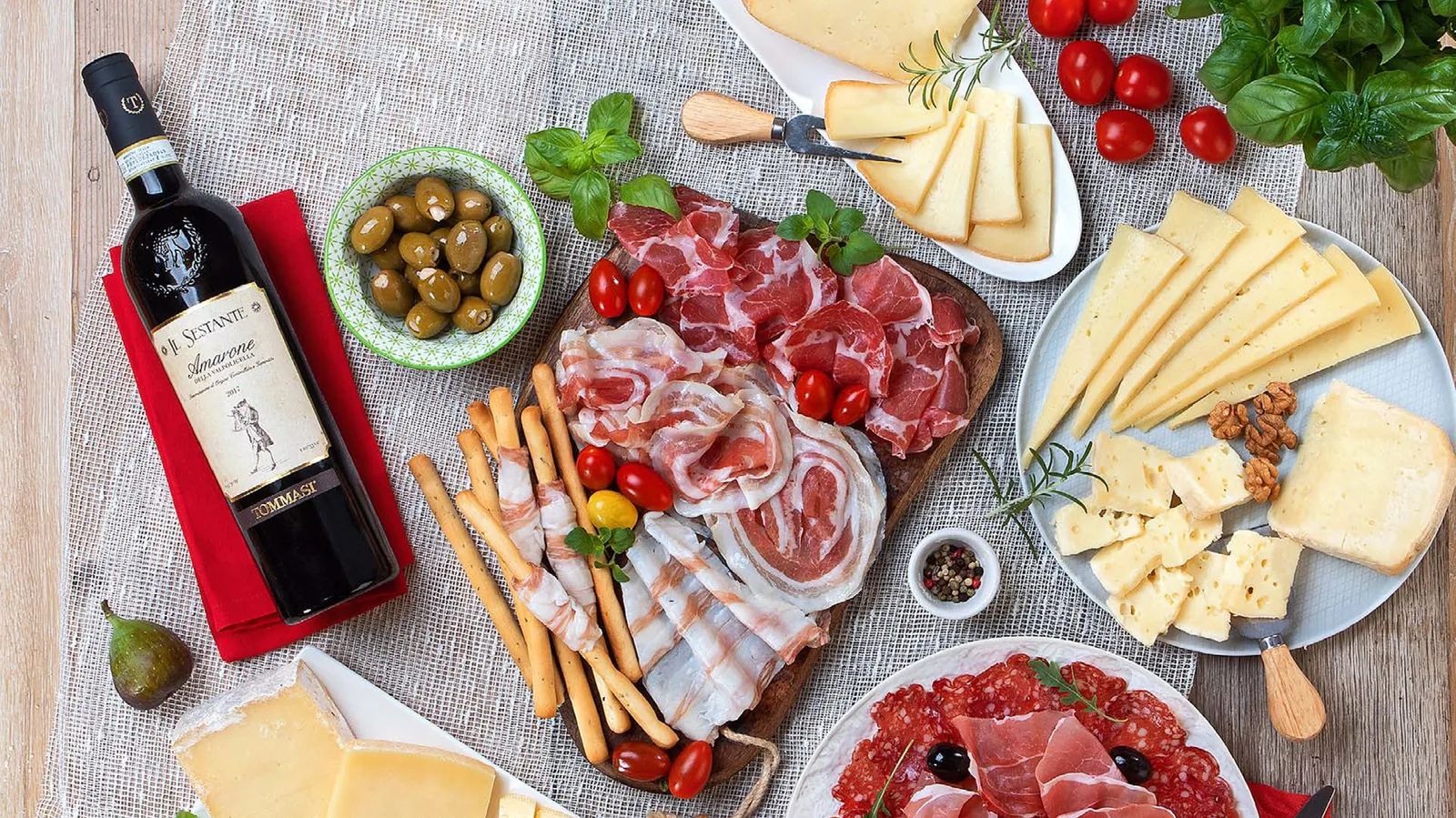 Food photography — charcuterie board with Vinosanto wine in warm natural light